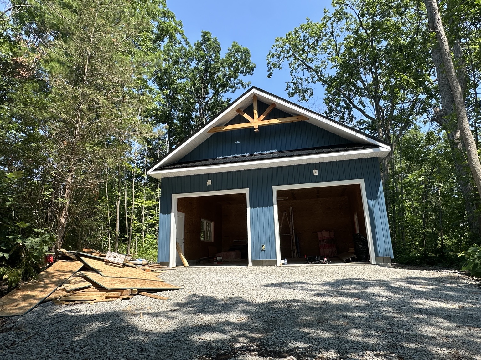 Blue detached garage exterior